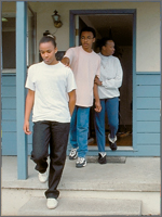 Family exiting house